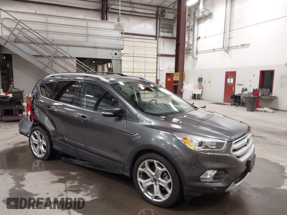 2019 Ford Escape Titanium with VIN 1FMCU9J91KUB11957, listed as a IAAI auction lot 41928264 with 72,460 mi miles. Bid and sale history available at carsss.com. Image 1.