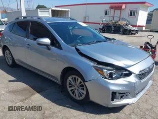 2018 Subaru Impreza Premium with VIN 4S3GTAB60J3720783, listed as a IAAI auction lot 41733875 with 76,748 mi miles. Bid and sale history available at carsss.com. Image 1.