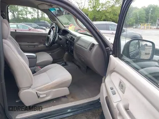 2002 Toyota Tacoma PreRunner with VIN 5TESM92N62Z097492, listed as a IAAI auction lot 42132865 with 138,624 mi miles and . Bid and sale history available at DreamBid. Image 5.