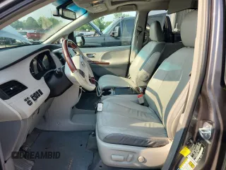 2011 Toyota Sienna XLE with VIN 5TDDK3DC6BS026264, listed as a Copart auction lot 60548865 with 147,516 mi miles and Salvage title. Bid and sale history available at DreamBid. Image 7.