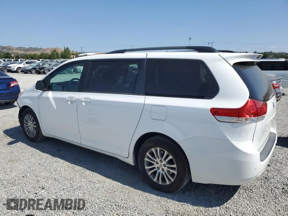 2013 Toyota Sienna XLE AAS с VIN 5TDYK3DC8DS391355, выставлен на аукционе Copart как лот 59232155 с пробегом 230 999 миль миль и Списание • Salvage title. История ставок и продаж доступна на DreamBid. Изображение 2.