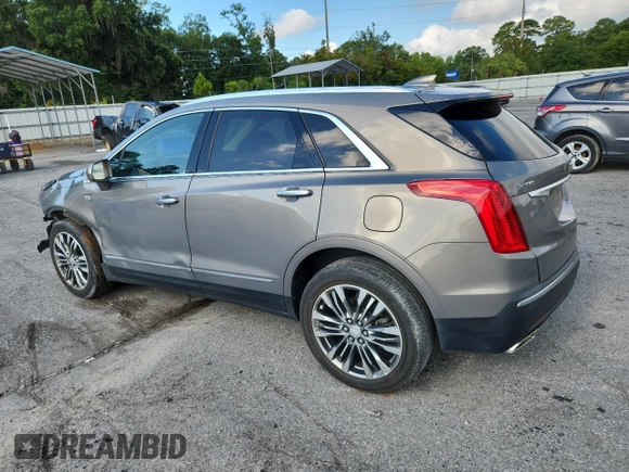 2019 Cadillac XT5 Luxury FWD z VIN 1GYKNCRS3KZ139886, wystawiony jako Copart lot #62167155 z przebiegiem 96 251 mil mil oraz Szkoda całkowita • Salvage title. Historia ofert i sprzedaży dostępna na DreamBid. Obrazek 2.