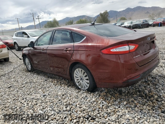 2016 Ford Fusion SE Hybrid with VIN 3FA6P0LU7GR250310, listed as a Copart auction lot 69625424 with 144,692 mi miles and Salvage title. Bid and sale history available at DreamBid. Image 2.