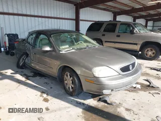 2003 Mercury Sable LS Premium with VIN 1MEFM55S43A631966, listed as a IAAI auction lot 41408623 with 130,010 mi miles. Bid and sale history available at carsss.com. Image 1.