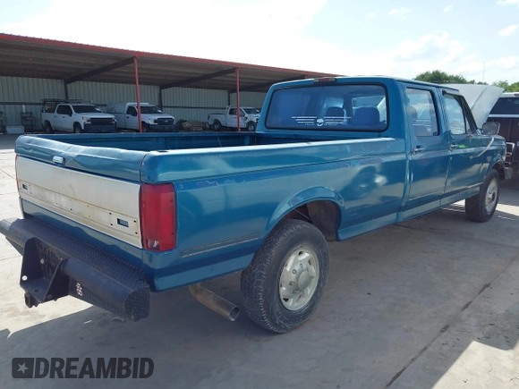 1994 Ford F-350 with VIN 1FTJW35K2REA09247, listed as a IAAI auction lot 42700543 with 157,000 mi miles and . Bid and sale history available at DreamBid. Image 4.