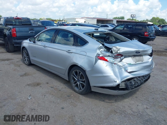 2017 Ford Fusion Hybrid SE with VIN 3FA6P0LU4HR234101, listed as a IAAI auction lot 42579447 with 169,273 mi miles and . Bid and sale history available at DreamBid. Image 3.