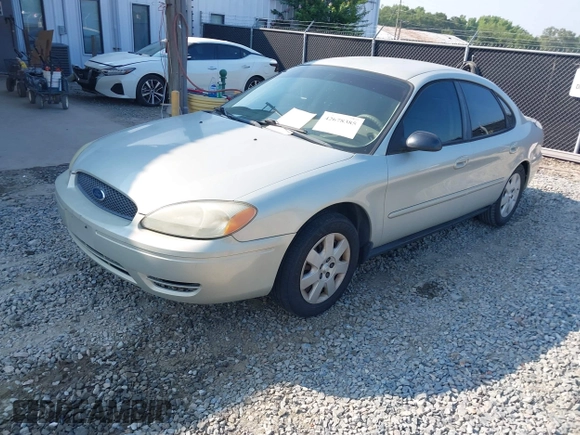 2005 Ford Taurus SE with VIN 1FAFP53205A131307, listed as a IAAI auction lot 42678385 with 198,491 mi miles and . Bid and sale history available at DreamBid. Image 2.