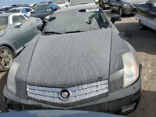 2006 Cadillac XLR z VIN 1G6YV36A965600309, wystawiony jako Copart lot #73937584 z przebiegiem Nie podano mil oraz Szkody całkowita. Historia ofert i sprzedaży dostępna na DreamBid. Obrazek 5.