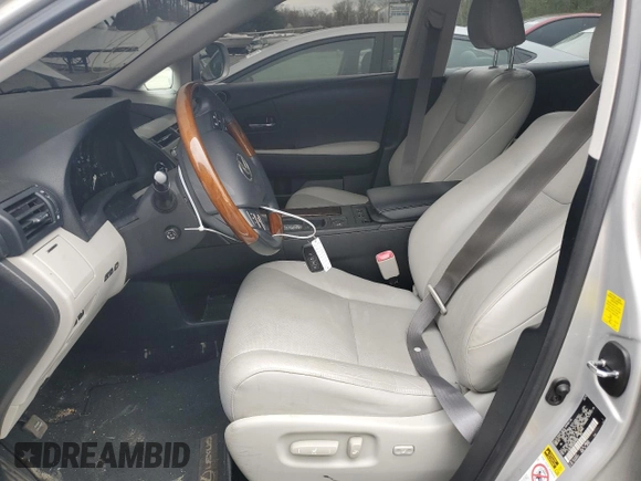 2010 Lexus RX 450h with VIN JTJBC1BA9A2409340, listed as a Copart auction lot 50181495 with 106,705 mi miles and Salvage Title. Bid and sale history available at DreamBid. Image 7.
