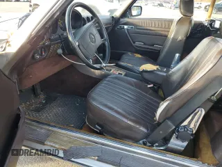 1987 Mercedes-Benz 560 560SL with VIN WDBBA48D9HA070265, listed as a Copart auction lot 77411844 with 120,884 mi miles and Salvage Title. Bid and sale history available at carsss.com. Image 7.