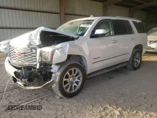 2019 GMC Yukon Denali with VIN 1GKS1CKJ7KR370524, listed as a Copart auction lot 77344394 with 39,753 mi miles and Salvage Title. Bid and sale history available at carsss.com. Image 1.