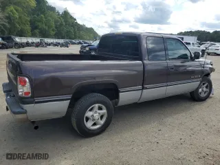 1997 Dodge Ram 1500 with VIN 1B7HC13Y8VJ603314, listed as a Copart auction lot 72765714 with 306,994 mi miles and Salvage Title. Bid and sale history available at carsss.com. Image 3.
