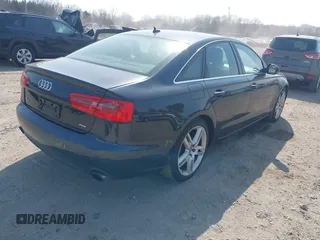 2015 Audi A6 Premium Plus z VIN WAUGFAFC8FN044809, wystawiony jako IAAI lot #41810102 z przebiegiem 153 577 mil mil oraz . Historia ofert i sprzedaży dostępna na DreamBid. Obrazek 4.