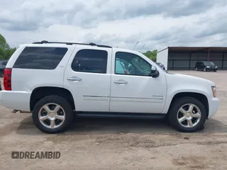 2012 Chevrolet Tahoe LTZ with VIN 1GNSKCE05CR177535, listed as a IAAI auction lot 42149054 with 184,830 mi miles and . Bid and sale history available at DreamBid. Image 13.