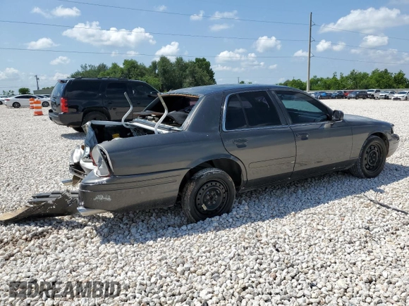 2007 Ford Police Interceptor with VIN 2FAFP71W27X152722, listed as a Copart auction lot 56252475 with 105,657 mi miles and Salvage title. Bid and sale history available at DreamBid. Image 3.