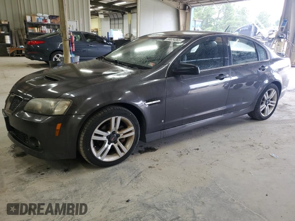 2009 Pontiac G8 z VIN 6G2ER57769L192376, wystawiony jako Copart lot #58634365 z przebiegiem 206 095 mil mil oraz Tytuł czysty. Historia ofert i sprzedaży dostępna na DreamBid. Obrazek 1.