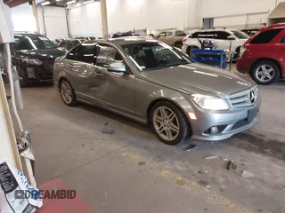 2009 Mercedes-Benz C-Class 3.5L Sport with VIN WDDGF56X09F203811, listed as a IAAI auction lot 41379469 with 138,617 mi miles. Bid and sale history available at carsss.com. Image 1.