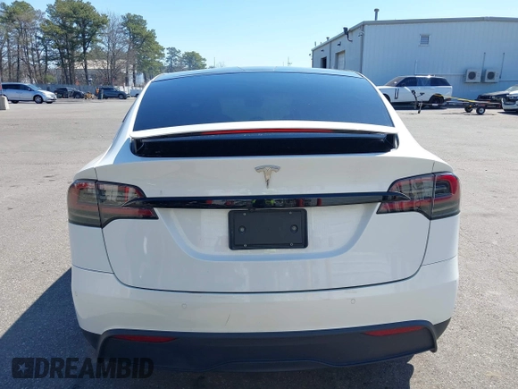 2022 Tesla Model X with VIN 7SAXCDE58NF342776, listed as a IAAI auction lot 42042369 with 70,301 mi miles and . Bid and sale history available at DreamBid. Image 16.
