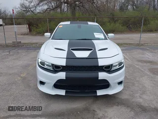 2019 Dodge Charger Scat Pack with VIN 2C3CDXGJXKH635612, listed as a IAAI auction lot 42010995 with 34,860 mi miles and . Bid and sale history available at DreamBid. Image 12.