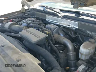 2019 Chevrolet Silverado 2500HD High Country with VIN 1GC1KUEY8KF171437, listed as a IAAI auction lot 41850872 with 114,027 mi miles and . Bid and sale history available at DreamBid. Image 18.