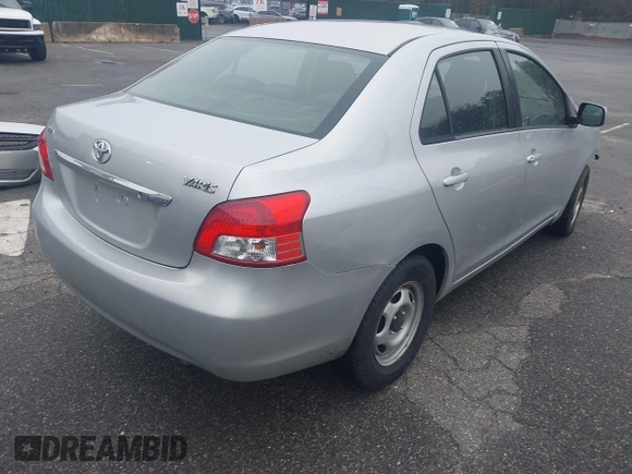 2009 Toyota Yaris with VIN JTDBT903694047246, listed as a IAAI auction lot 41961204 with 154,430 mi miles. Bid and sale history available at carsss.com. Image 4.