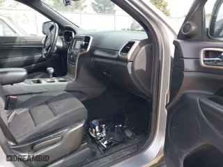 2014 Jeep Grand Cherokee Laredo with VIN 1C4RJFAG7EC243121, listed as a IAAI auction lot 41925695 with 147,999 mi miles. Bid and sale history available at carsss.com. Image 5.