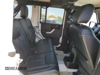2015 Jeep Wrangler Unlimited Rubicon with VIN 1C4BJWFG6FL508493, listed as a Copart auction lot 54788635 with 127,694 mi miles and Salvage title. Bid and sale history available at DreamBid. Image 11.