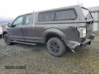 2015 Ford F-150 XLT with VIN 1FTEX1E89FKD82676, listed as a Copart auction lot 50723925 with 65,024 mi miles and Salvage Title. Bid and sale history available at carsss.com. Image 2.