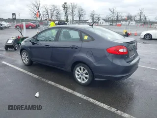 2012 Ford Fiesta SE with VIN 3FADP4BJ0CM155729, listed as a IAAI auction lot 41800447 with 90,091 mi miles. Bid and sale history available at carsss.com. Image 3.