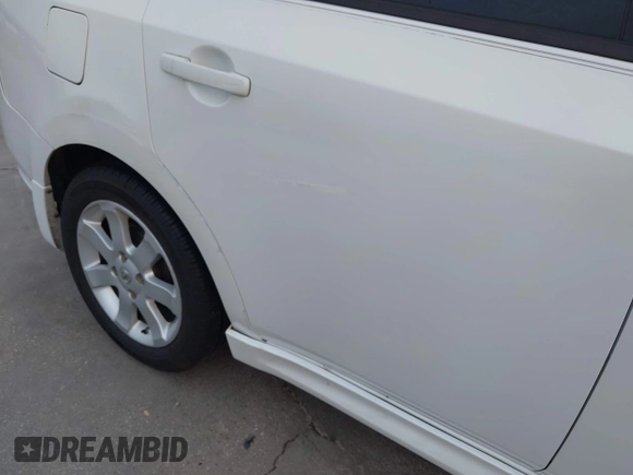 2012 Nissan Sentra SR with VIN 3N1AB6AP6CL623744, listed as a IAAI auction lot 42150852 with 106,383 mi miles and . Bid and sale history available at DreamBid. Image 20.