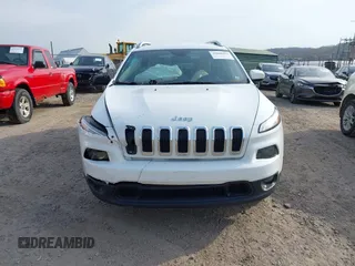 2016 Jeep Cherokee Latitude with VIN 1C4PJMCS1GW242545, listed as a IAAI auction lot 42048421 with 84,667 mi miles and . Bid and sale history available at carsss.com. Image 13.