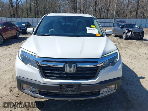 2020 Honda Ridgeline RTL-E with VIN 5FPYK3F75LB000317, listed as a IAAI auction lot 41850029 with 17,430 mi miles and . Bid and sale history available at DreamBid. Image 13.