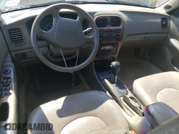 1999 Hyundai Sonata GLS with VIN KMHWF35V9XA100869, listed as a Copart auction lot 68219694 with 144,388 mi miles and Non Repairable. Bid and sale history available at carsss.com. Image 8.
