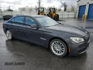 2015 BMW 7 Series 740Li with VIN WBAYE4C52FD947509, listed as a Copart auction lot 49269705 with 80,111 mi miles and Salvage Title. Bid and sale history available at carsss.com. Image 4.