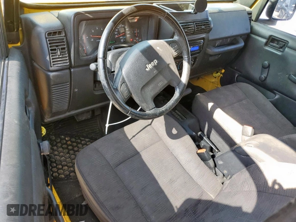 2003 Jeep Wrangler Sport with VIN 1J4FA49S43P369906, listed as a Copart auction lot 58079235 with 139,547 mi miles and Salvage title. Bid and sale history available at DreamBid. Image 8.