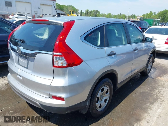 2015 Honda CR-V LX z VIN 2HKRM3H39FH500617, wystawiony jako IAAI lot #42028379 z przebiegiem 97 117 mil mil oraz . Historia ofert i sprzedaży dostępna na DreamBid. Obrazek 4.
