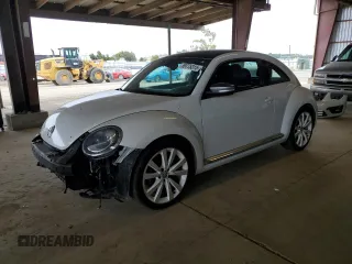 2014 Volkswagen Beetle 1.8T с VIN 3VWJ17AT8EM653227, выставлен на аукционе Copart как лот 59775315 с пробегом 89 574 миль миль и Списание • Salvage title. История ставок и продаж доступна на DreamBid. Изображение 1.