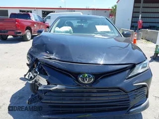 2023 Toyota Camry LE z VIN 4T1C11AK2PU120803, wystawiony jako IAAI lot #42060384 z przebiegiem 38 897 mil mil oraz . Historia ofert i sprzedaży dostępna na DreamBid. Obrazek 13.