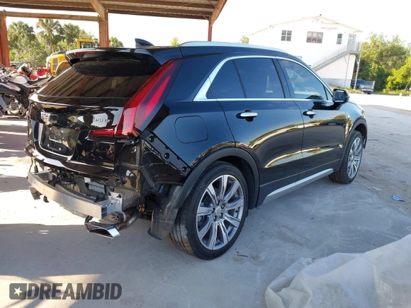 2020 Cadillac XT4 FWD Premium Luxury with VIN 1GYFZCR42LF144359, listed as a IAAI auction lot 42012677 with 34,490 mi miles and . Bid and sale history available at carsss.com. Image 4.