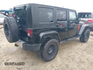 2008 Jeep Wrangler Unlimited Sahara with VIN 1J4GA59128L504798, listed as a IAAI auction lot 42210839 with 162,406 mi miles and . Bid and sale history available at DreamBid. Image 4.