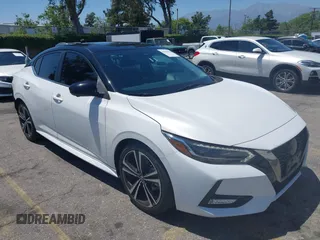 2021 Nissan Sentra SR z VIN 3N1AB8DV0MY245835, wystawiony jako IAAI lot #42320378 z przebiegiem 100 949 mil mil oraz . Historia ofert i sprzedaży dostępna na DreamBid. Obrazek 1.