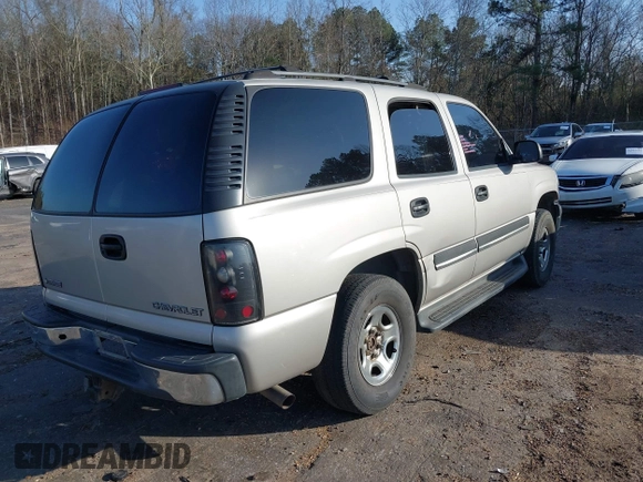 2004 Chevrolet Tahoe LT z VIN 1GNEC13Z94R253470, wystawiony jako IAAI lot #41575306 z przebiegiem 274 287 mil mil oraz . Historia ofert i sprzedaży dostępna na DreamBid. Obrazek 4.