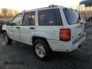 1996 Jeep Grand Cherokee z VIN 1J4FX78S6TC221815, wystawiony jako Copart lot #44000615 z przebiegiem 287 308 mil mil oraz Szkoda całkowita • Salvage title. Historia ofert i sprzedaży dostępna na DreamBid. Obrazek 2.