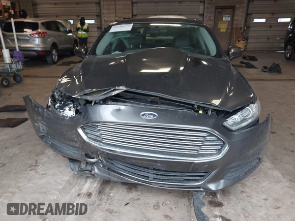 2015 Ford Fusion S Hybrid with VIN 3FA6P0UU8FR178675, listed as a IAAI auction lot 42104712 with 129,998 mi miles. Bid and sale history available at carsss.com. Image 12.