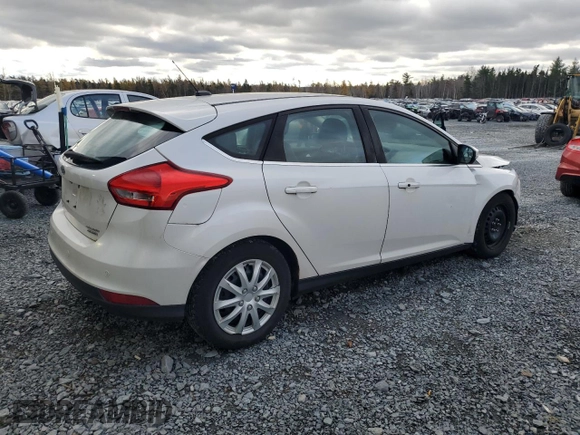 2015 Ford Focus Titanium with VIN 1FADP3N26FL265043, listed as a Copart auction lot 75539713 with Not provided miles and Clean title. Bid and sale history available at DreamBid. Image 3.