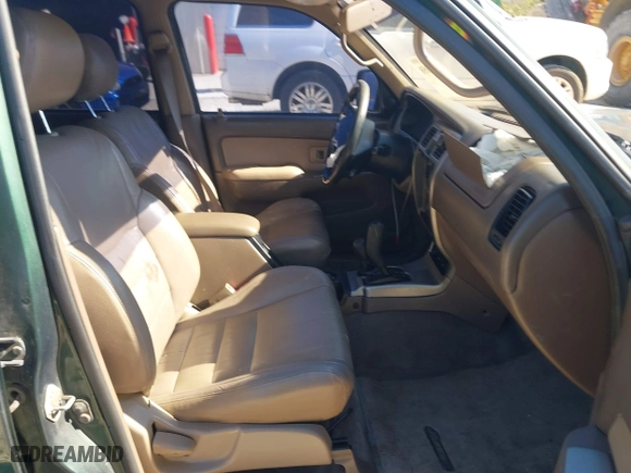 2001 Toyota 4Runner SR5 with VIN JT3HN86R310335526, listed as a IAAI auction lot 41288058 with 202,219 mi miles. Bid and sale history available at carsss.com. Image 5.