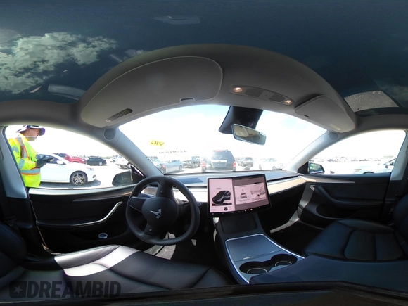 2024 Tesla Model Y with VIN 7SAYGDED3RF019063, listed as a IAAI auction lot 42061888 with 13,763 mi miles and . Bid and sale history available at DreamBid. Image 17.