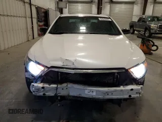 2015 Ford Taurus SHO z VIN 1FAHP2KT1FG157026, wystawiony jako Copart lot #52846065 z przebiegiem 125 107 mil mil oraz Szkoda całkowita • Salvage title. Historia ofert i sprzedaży dostępna na DreamBid. Obrazek 5.