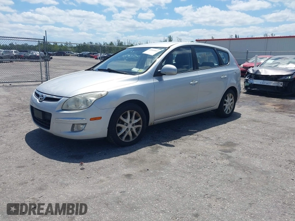 2009 Hyundai Elantra Touring with VIN KMHDC86E99U035163, listed as a IAAI auction lot 42049897 with 123,559 mi miles and . Bid and sale history available at DreamBid. Image 2.