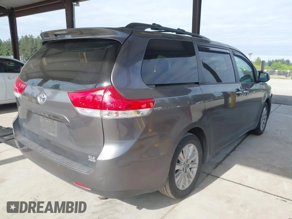 2014 Toyota Sienna Limited z VIN 5TDDK3DC9ES088584, wystawiony jako IAAI lot #42333016 z przebiegiem 115 138 mil mil oraz . Historia ofert i sprzedaży dostępna na DreamBid. Obrazek 4.